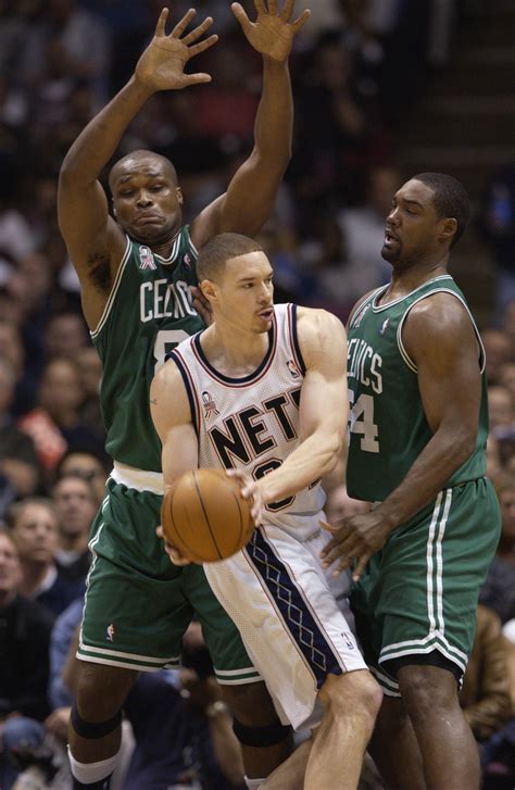 New Jersey Nets players celebrating after defeating the Boston Celtics.