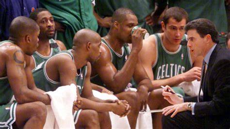 Rick Pitino giving instructions to the Celtics players.