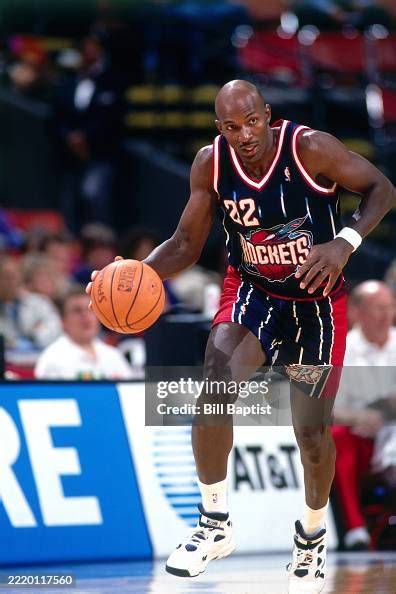 Hakeem Olajuwon blocking a shot in a game