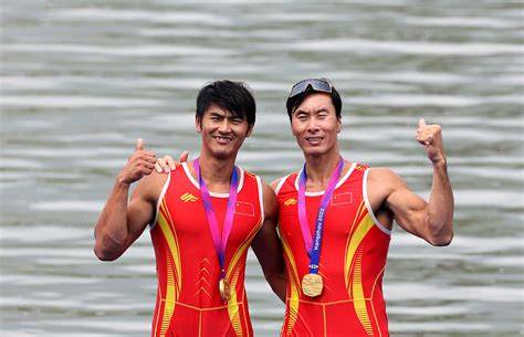 Chinese athletes proudly displaying their medals at the Asian Games podium.