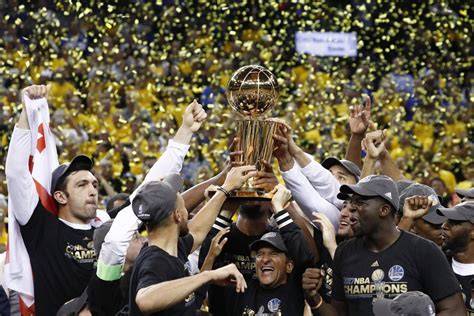 Warriors players celebrating after defeating the Lakers.