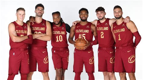 Cleveland Cavaliers players celebrating their victory on the court.
