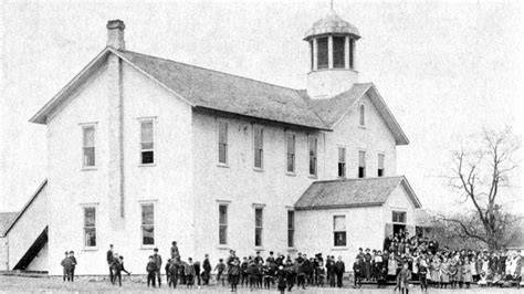 A historic school building that was established by a community leader, showcasing its architecture.