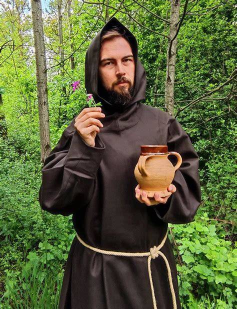 A Franciscan monk living simply, surrounded by minimal possessions.