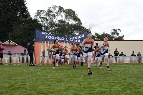 Young players from Sorell Football Club practicing drills during training.