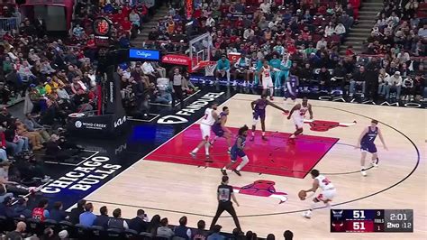 Charlotte Hornets players on the court during a game against the Chicago Bulls