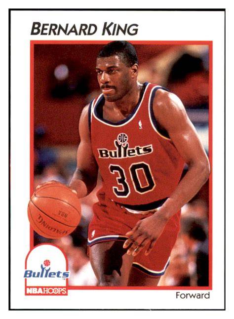 Bernard King dribbling the ball during a game.