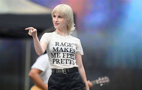 Hayley Williams is sitting on a couch, speaking openly about mental health themes in her show.