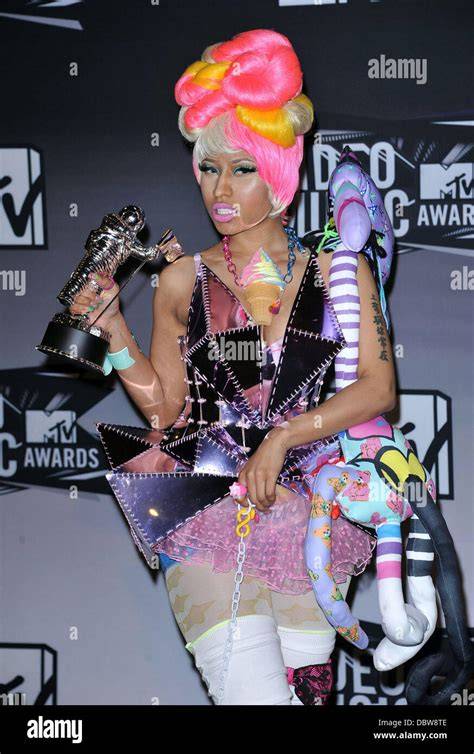 Nicki Minaj showcasing her awards collection in her home