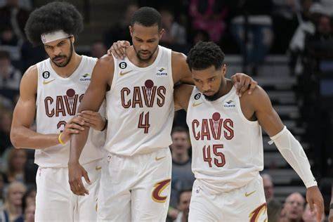 Cleveland Cavaliers players walking off the court after a game.