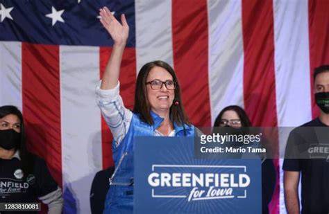 Theresa Greenfield campaigning door-to-door during an election.